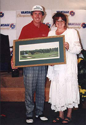 1995, when the golf prints of “The 18th Hole at Tanglewood” were released, Hale Erwin was the championship winner. This is a picture of Patricia Hobson and Mr. Erwin.